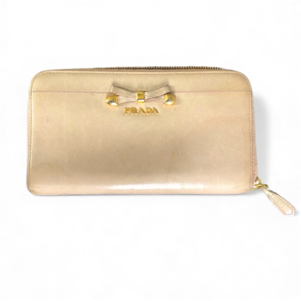 Prada Authentic Tan Leather Zip Around Bow Wallet with Gold Tone Hardware